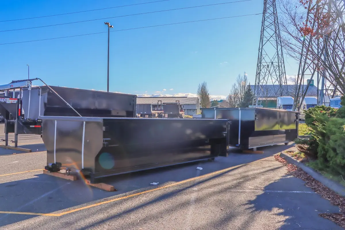 Roll-off dumpster ready for waste disposal at job site for Residential Dumpster Rental in Clinton